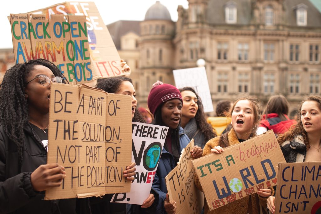 women protesting with banners